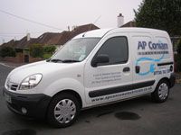White van with blue logo on side